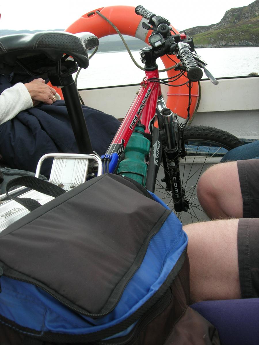 Bike on board (not my legs).JPG