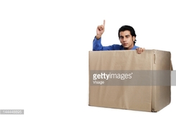 144448895-man-sitting-in-a-cardboard-box-gettyimages.jpg