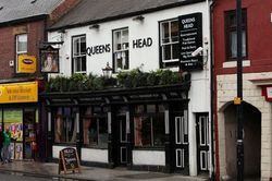 the-queen-s-head-pub-on-wallsend-high-street-403947354.jpg