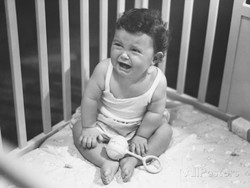 george-marks-baby-girl-crying-in-playpen-1.jpg