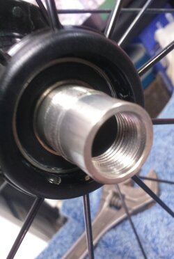 axle and sealed bearing in place .JPG