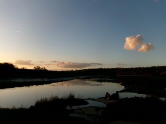 250228-0210  Sea Mills Reach sunset-reclining cyclist.JPG