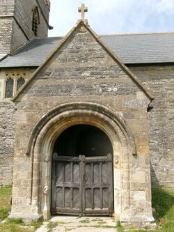 250523-1687 Moorlinch St Mary-porch Norman arch-jamb heads.JPG