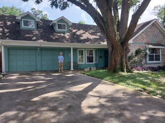 Ken in front of house.jpg