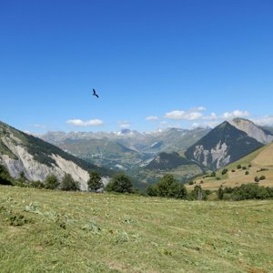 View northwest towards the climb up to Col de la Croix de Fer from the road above and south of Chalmieu