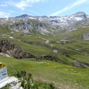 View of nearby fields and peaks near top of climb to Col de l'Iseran