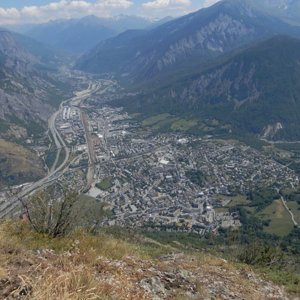 Saint-Jean-de-Maurienne viewed from Croix de Chevrotière on cliff 900m above