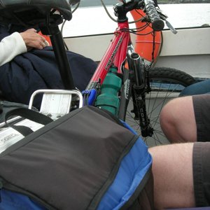 Bike on board (not my legs).JPG