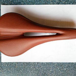 Brown leather saddle.