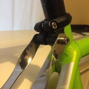 Seat post clamp with rack bolts