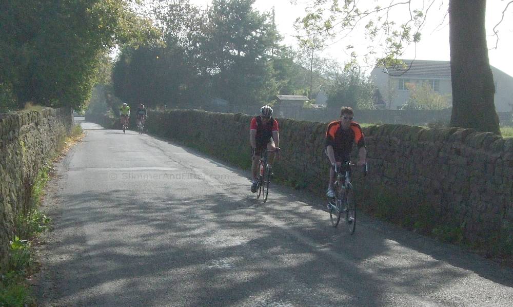 cyclechatters-at-fence-wide.jpg