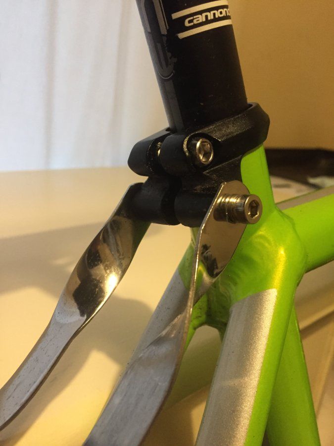 Seat post clamp with rack bolts