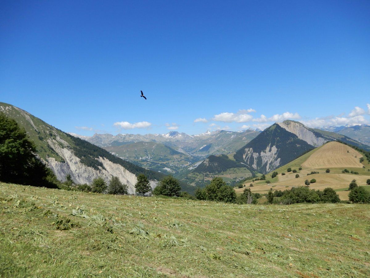 View northwest towards the climb up to Col de la Croix de Fer from the road above and south of Chalmieu