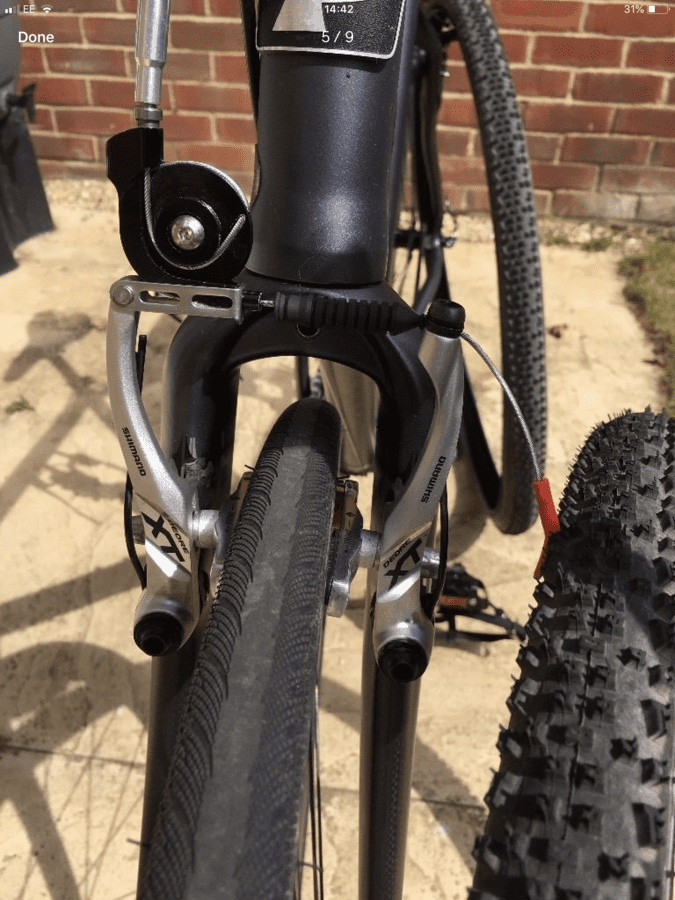 XT V-brakes with Dura-ace brifters via travel agent -